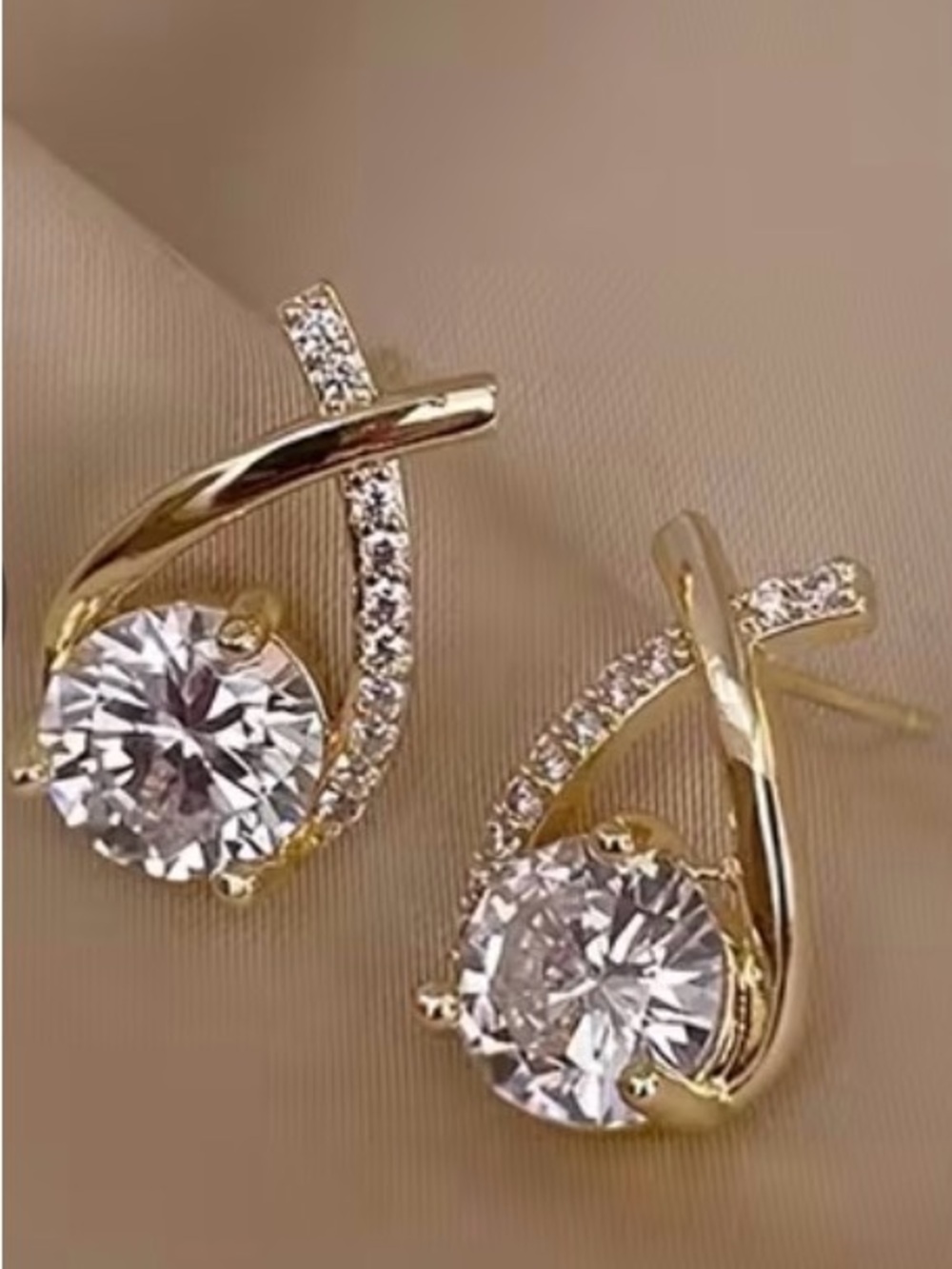 Gold-tone Crystal Swirl Stud Earrings - Clear